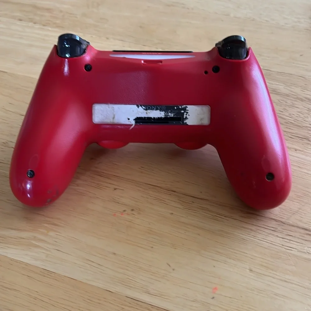 DualShock 4 Wireless Controller for PlayStation 4 - Magma Red used Red